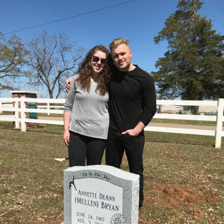 Zack Bryan with his sister Mackenzie at the grave of their mother Annette DeAnn (Mullen) Bryan.